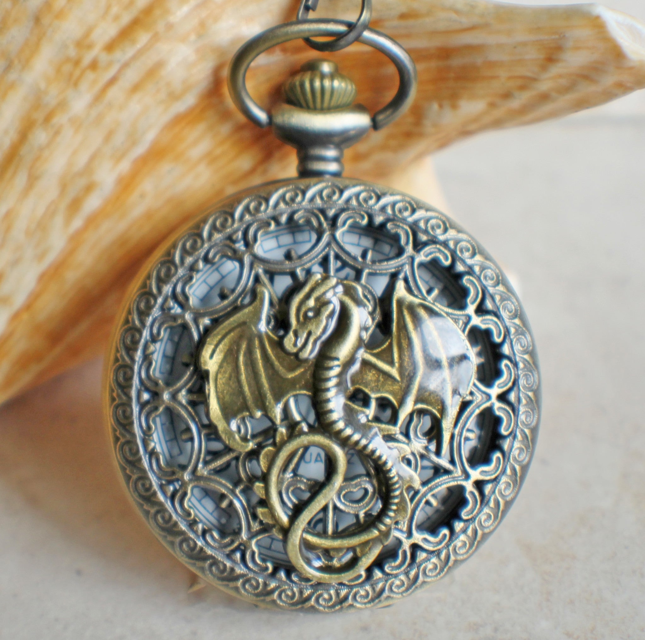 IMG_1014_fc2465fd-e97f-429f-9047-fb7a3fce3cef.jpg Dragon Pocket Watch Battery Operated - Image 1