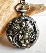 Four leaf clover pocket watch in bronze, battery operated.