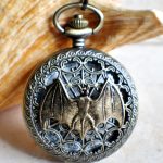 Bat battery operated pocket watch in bronze.