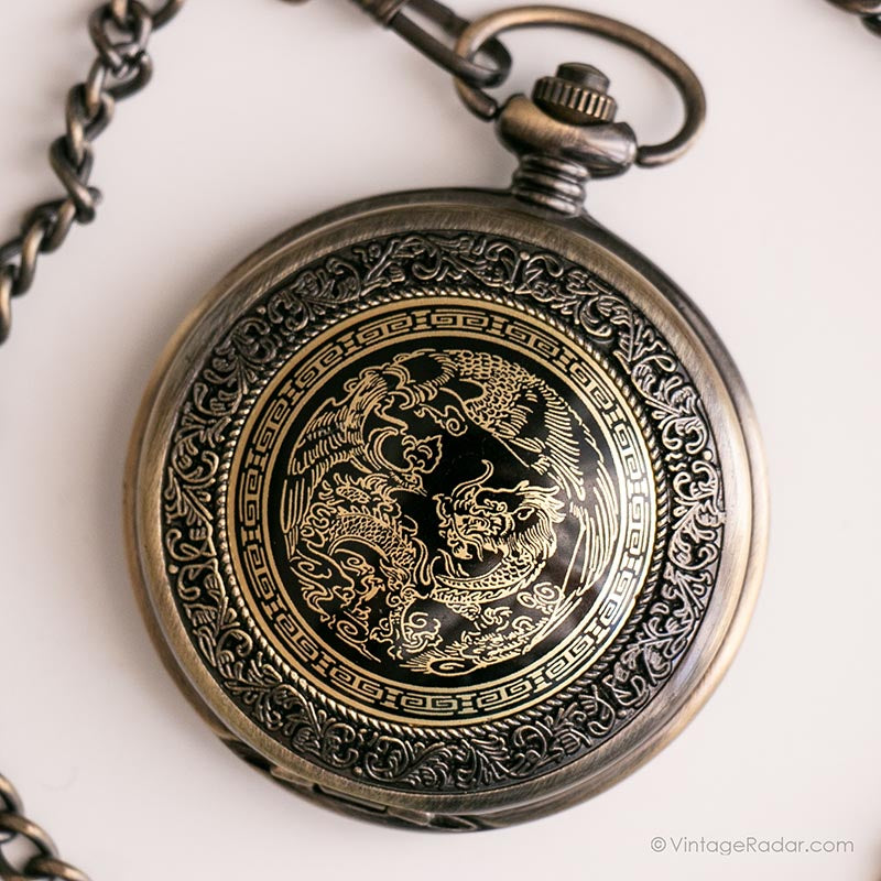IMG_8418_641726ff-4e5d-468b-9dfa-3c12010ca6ad.jpg Vintage Dragon Pocket Watch | Gold-tone Vest Watch with Black Details - Image 1