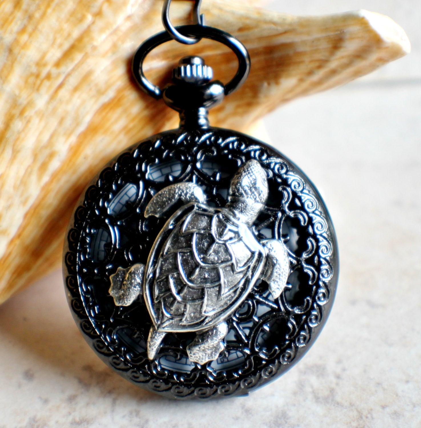il_fullxfull.966403850_c7cz.jpeg Turtle pocket watch battery operated in black. - Image 1